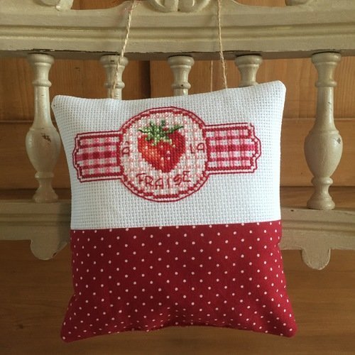 Coussin de porte brodé 