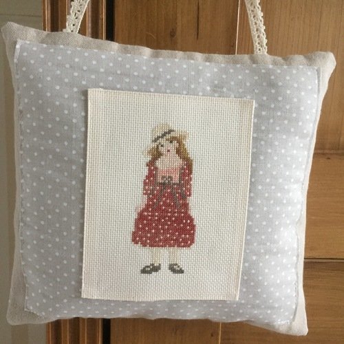 Coussin de porte brodé