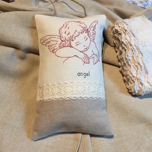 Coussin de porte brodé 