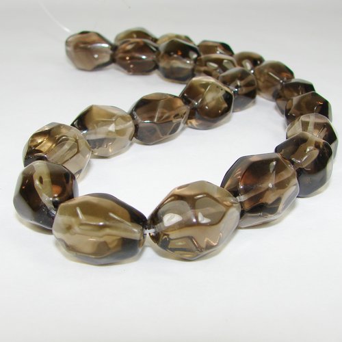 Quartz fumé roulé 18 mm à facettes.