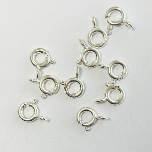 Fermoir à ressort 6 mm épais.