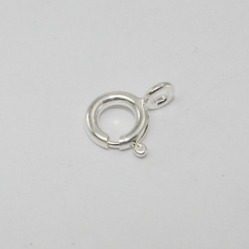 Fermoir à ressort 7 mm épais.