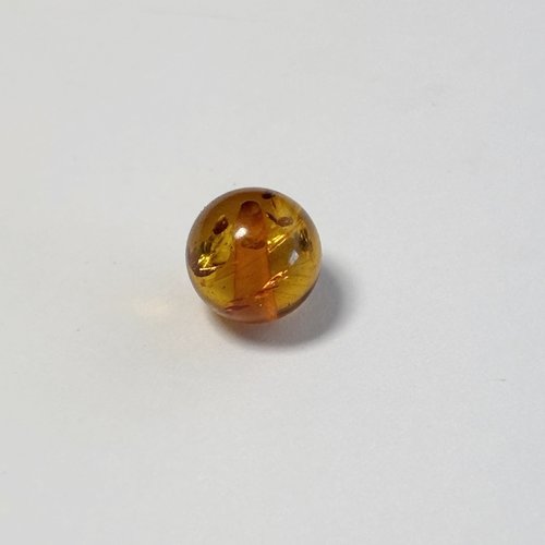 Perle en ambre naturel ronde 7 mm – vendue à l’unité