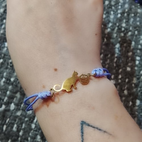 Bracelet chat pelote dorée mauve