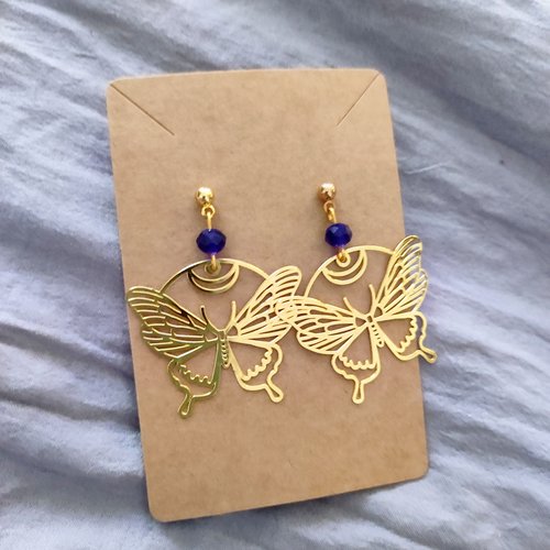 Boucle d'oreille  papillon doré bleu