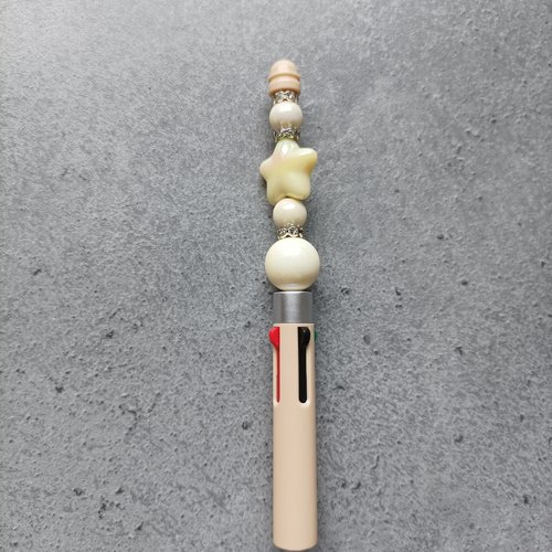 Stylo étoile beige