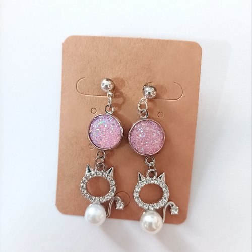 Boucles d'oreilles  petit diable rose