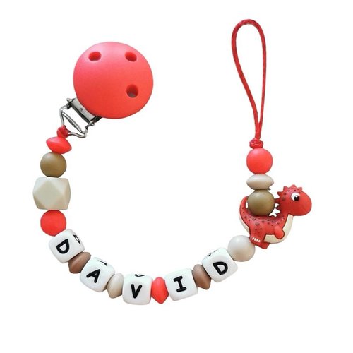 Attache tétine en silicone dinosaure