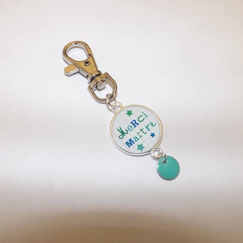 Porte clé &quot; merci maître &quot;+ carte offerte composé d'un sequin rouge 