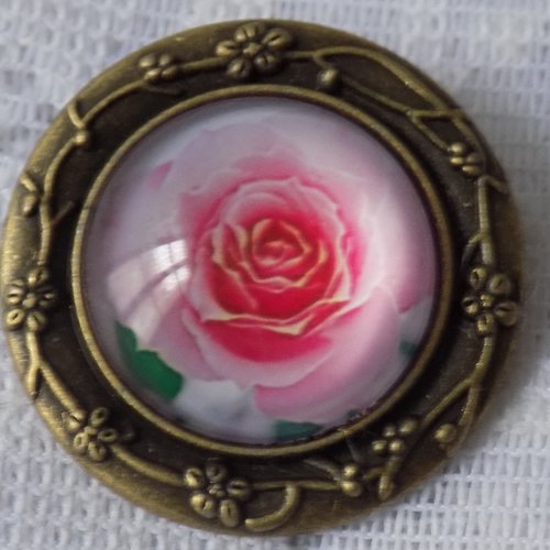 Broche ronde,bronze,cabochon en verre,motif rose.
