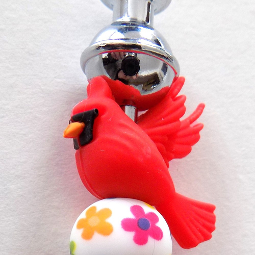 Ouvre-lettres , coupe papier angry-bird , perles silicone , coloris argent/rouge.