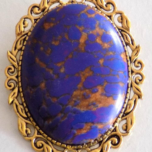 Grande broche ovale , cabochon pierre naturelle , coloris or/bleu.