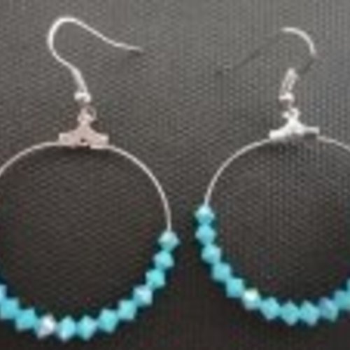 Boucles d'oreilles créoles toupies cristal sxarovski bleu