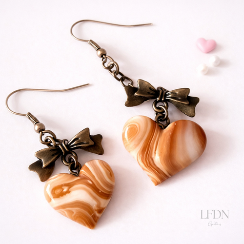 Boucles d'oreille coeurs pendantes