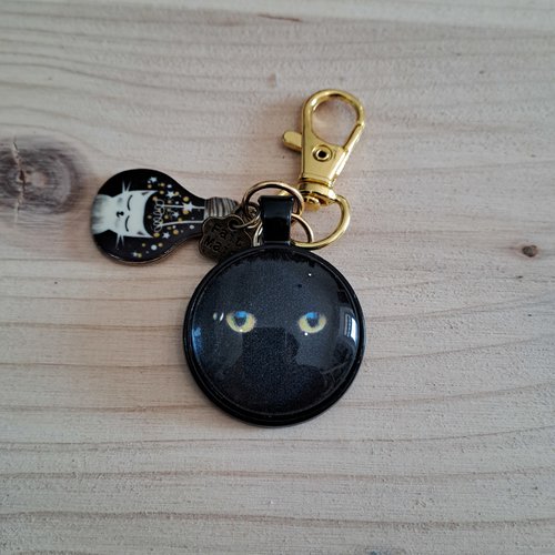 Porte clef cabochon chat aux yeux dorés