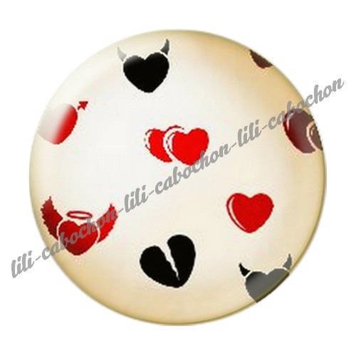 Cabochon résine a coller 25 mm mi-ange mi-démon 21 