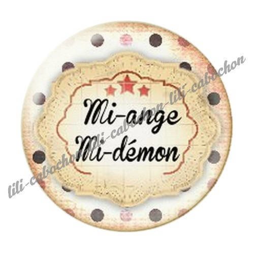 Cabochon résine a coller 25 mm mi-ange mi-démon 22 