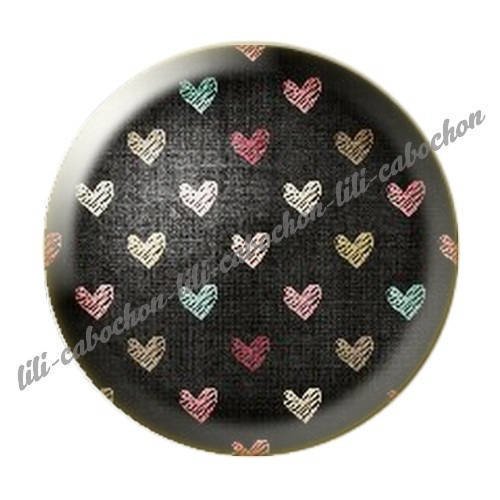 Cabochon résine a coller 25 mm mi-ange mi-démon 25 