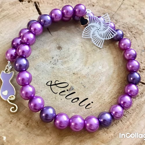 Bracelet fantaisie en perles nacrées violet