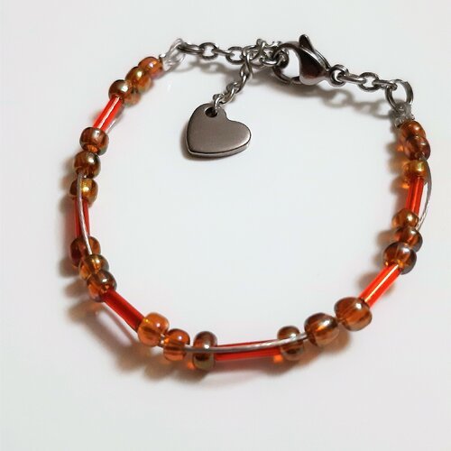 Bracelet perles fantaisie gourmette chaine et fil cablé en acier perles en rocaille ambre irisée