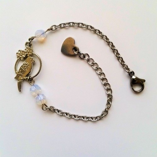 Bracelet fantaisie acier perles swarovsky breloque perroquet