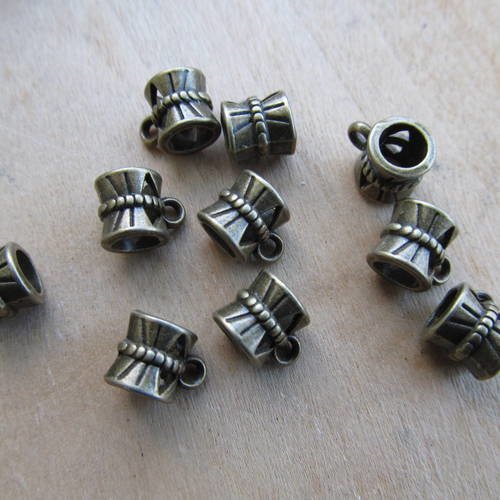 Lot de 5 bélières de 11 x 7 mm en métal de couleur: bronze. 