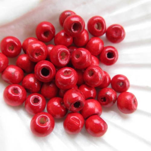 Lot de 50 perles de 8 mm de diamètre en bois peint de couleur: rouge cerise. 