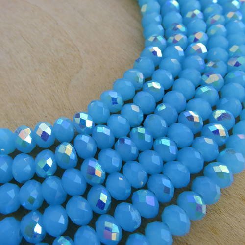 Lot de 50 perles forme boulier en verre à facettes de 6 x 4 mm de couleur: bleu ciel. 