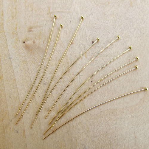 1 lot de 25 tiges  à tête boule de 60 x 0.7 mm en laiton couleur: or.