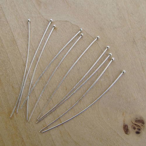 1 lot de 25 tiges  à tête boule de 60 x 0.7 mm en laiton couleur: argent.