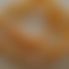 Lot de 20 petites perles gouttes de 6 x 4 mm en verre facetté plaqué ab de couleur: mandarine. 