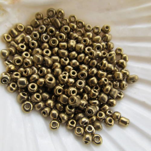 *sachet de 25 g de perles de rocaille de 4 mm en verre de couleur : bronze.