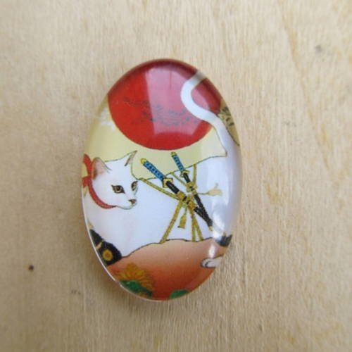 Cabochon en verre de forme ovale de 30 x 20 mm avec image de fond décor: dessin de chat. 