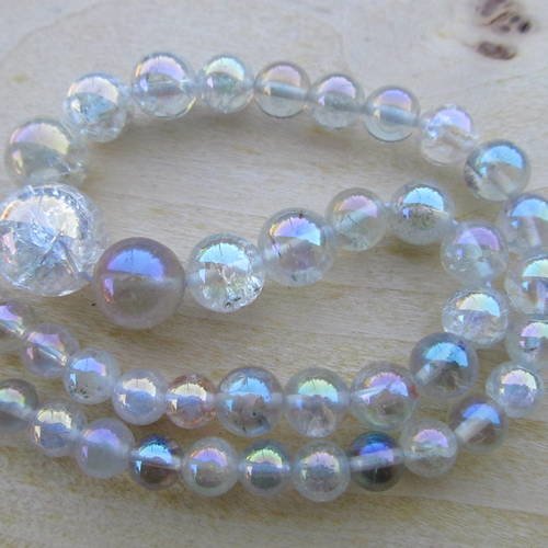 Chapelet en dégradé de perles de 6 à 14 mm en véritable cristal de roche craquelé plaqué ab. 