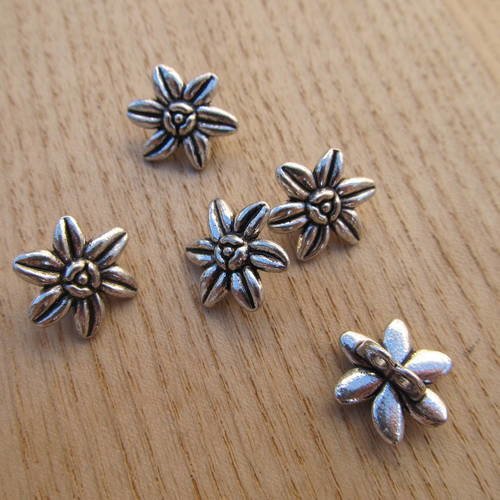 Connecteur perle multi-rang en forme d'edelweiss de  15mm en métal couleur:  argent vieilli. 