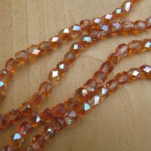 *lot de 10 perles de 6 x 6 mm, forme "tonneau", en verre à facettes, de couleur: ambre.