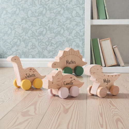 Dinosaures en bois à roulette - personnalisables au laser