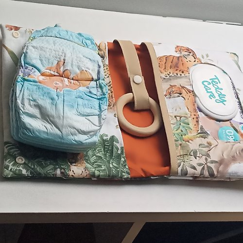 Pochette à couches, pochette à langer nomade