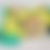 Sac bandouliere fermoir rétro en cuir vert et jaune et tissus motif fleurs