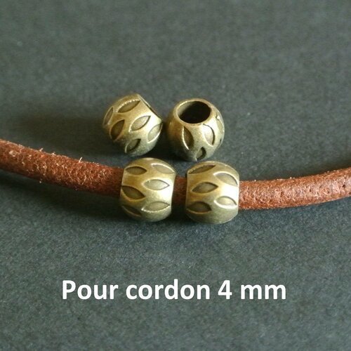 5 perles bronze forme ronde décor encoches en forme de navettes, 9 x 7 mm, trou rond : 5 mm pour cordon 4 mm,