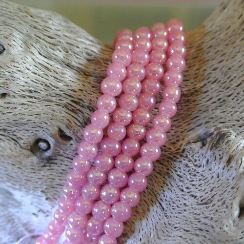 20 perles rondes lisses 6 mm en verre rose saumon clair irisé