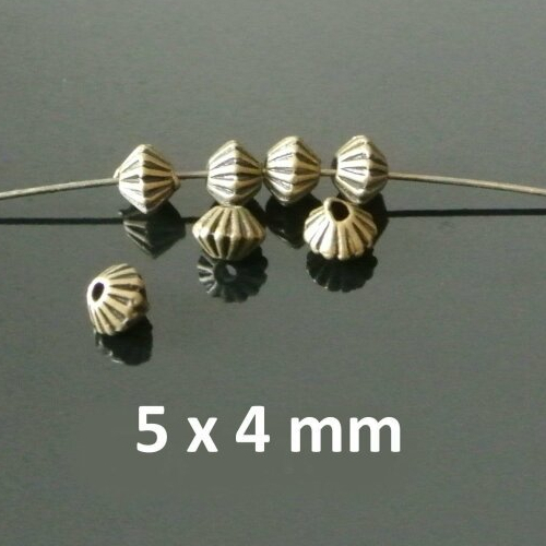 Lot de quarante perles forme toupie à stries en métal couleur bronze, 5 x 4 mm, trou : environ 1 mm