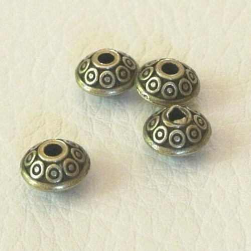 30 perles intercalaires forme soucoupe ou toupie métal bronze, motifs géométriques, 6 x 4 mm