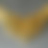 Une grande breloque dorée deux ailes d'ange ajourées, 50 x 68 x 4 mm, trois trous 2 mm, possibilité d'insérer des strass