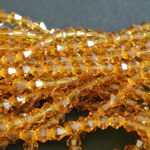 40 très petites perles toupies cristal ambre 4 x 4 mm, verre cristal à facettes translucide, trou 1 mm environ