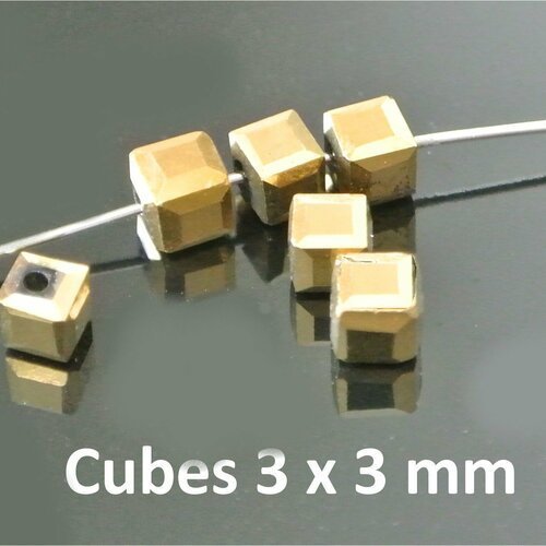 20 petites perles forme cubiques cubes, 3 x 3 mm, angles coupés, en verre à facettes couleur or doré irisé