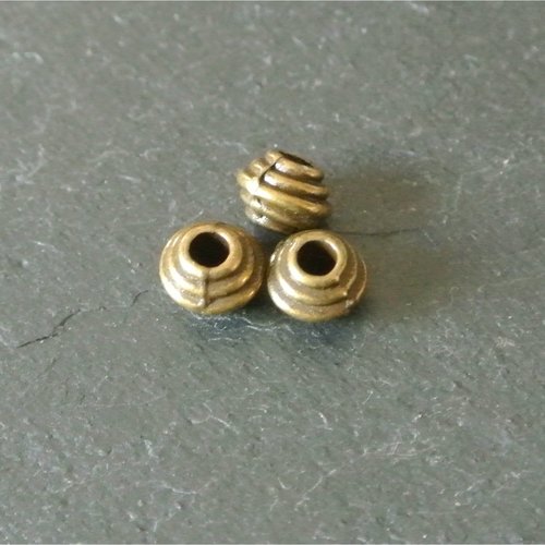10 perles toupies à bourrelets métal bronze, 6 x 5 mm, trou 2 mm environ