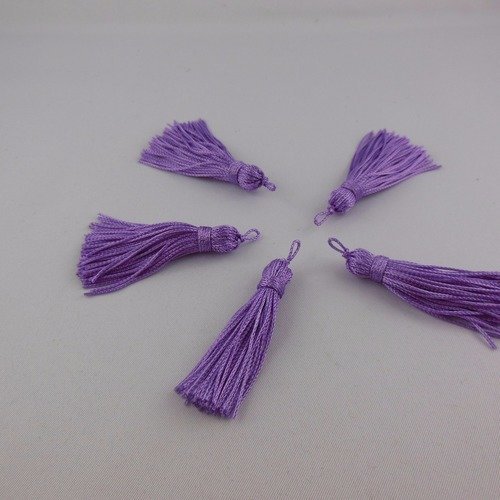 Pompons à fil mauve lilas