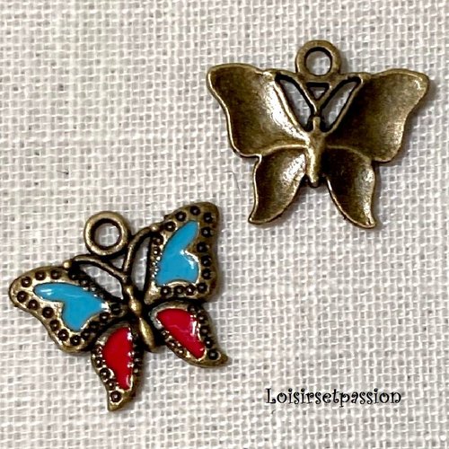 Breloque / charm / pendentif - papillon bicolore, bleu rouge, métal bronze ** 24 x 20 mm ** vendu à l'unité - 195