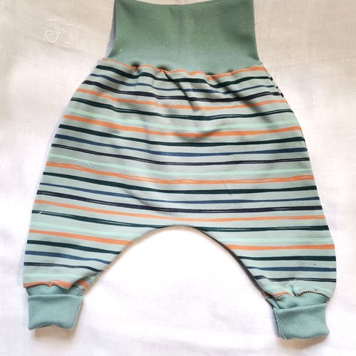 Sarouel évolutif bébé molletonné à rayures fond bleu clair